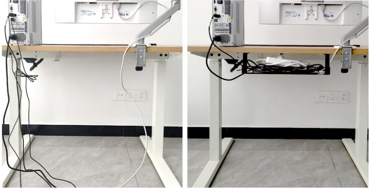 Technicus die kabels onder een bureau ordent